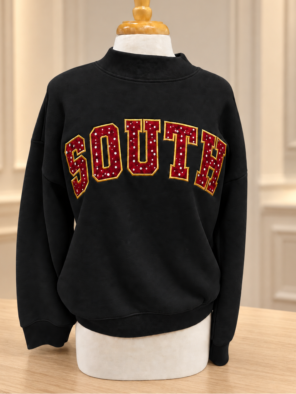 South applique mock neck sweatshirt